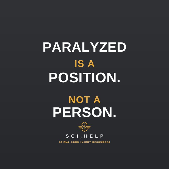 Black shirt design reading PARALYZED IS A POSITION, NOT A PERSON